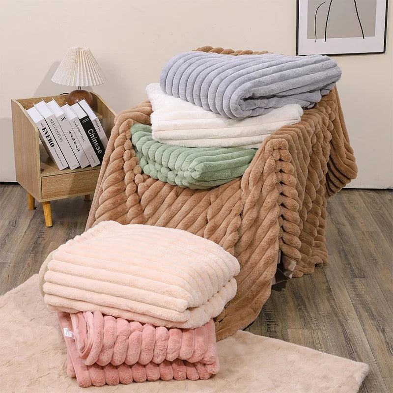 Pile de plaids nervurés Nid Douillet en plusieurs coloris